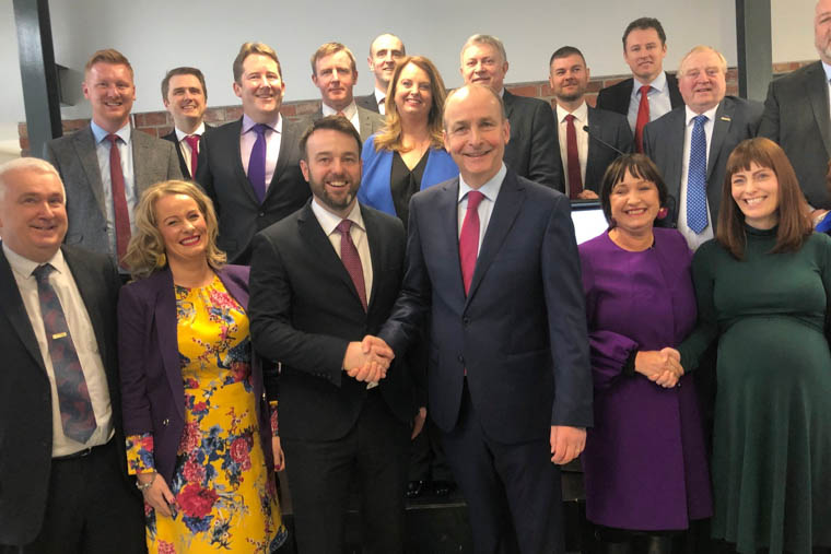 SDLP leader Colum Eastwood and Fianna Fáil leader Micheál Martin with party members at the launch of the new partnership. SDLP leader Colum Eastwood and Fianna Fáil leader Micheál Martin with party members at the launch of the new partnership.