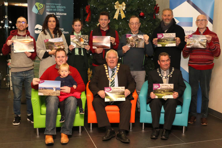 Pictured are participants in the first AONB photographic calendar competition held across the three AONB areas in County Down. Included are (front)Alderman Bill Kerry, Mayor of Ards and North Down Council, and Cllr Terry Andrews, Vice Chair of Newry Mourne and Down District Council, who acted as judges along with Dessie Patterson, Chair of the Mourne Heritage Trust (absent). The 12 winners each received framed prints of their work. Pictured are participants in the first AONB photographic calendar competition held across the three AONB areas in County Down. Included are (front)Alderman Bill Kerry, Mayor of Ards and North Down Council, and Cllr Terry Andrews, Vice Chair of Newry Mourne and Down District Council, who acted as judges along with Dessie Patterson, Chair of the Mourne Heritage Trust (absent). The 12 winners each received framed prints of their work.