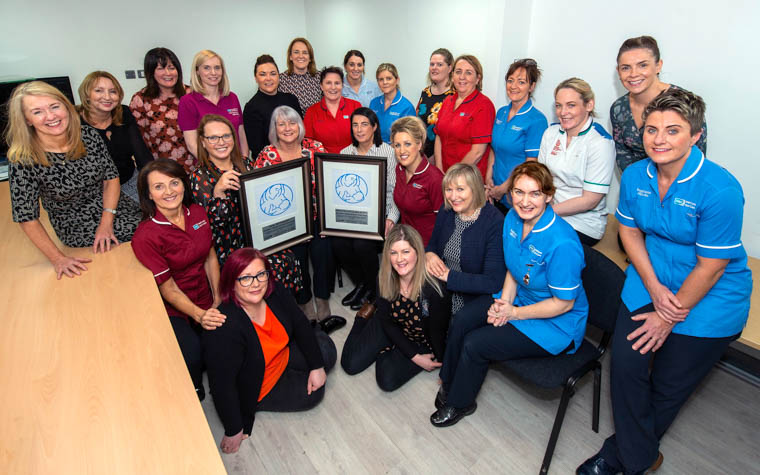 Wendy Clarke, Head of Midwifery and Gynaecology; Sandra Hewitt, Infant Feeding specialist midwife and staff who celebrated receiving the Baby Friendly for Daisy Hill Hospital and Newry and Mourne Locality. Wendy Clarke, Head of Midwifery and Gynaecology; Sandra Hewitt, Infant Feeding specialist midwife and staff who celebrated receiving the Baby Friendly for Daisy Hill Hospital and Newry and Mourne Locality.