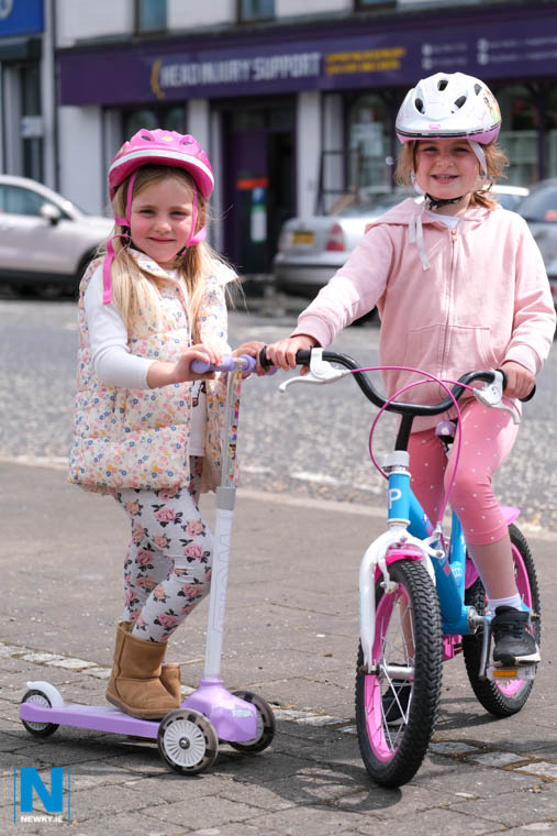 Lara and Aibha Loughran from Camlough get their wheels ready for Aibha's Bike Challenge. Photograph: Columba O'Hare/ Newry.ie Lara and Aibha Loughran from Camlough get their wheels ready for Aibha's Bike Challenge. Photograph: Columba O'Hare/ Newry.ie