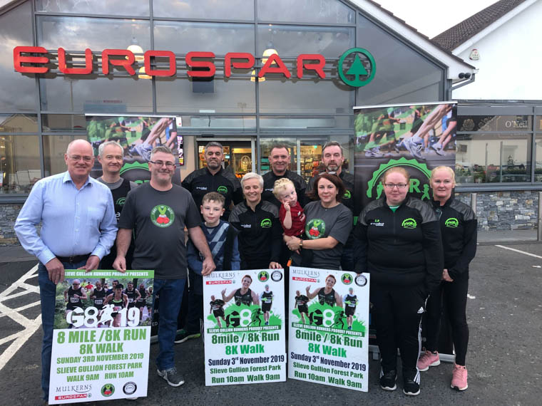 Members of the Slieve Gullion Runners  with Alfie’s Dad Jamie  his sister Leigh-Jane and her two kids Johnny and Stephen with Terry Mulkerns from Mulkerns’ Eurospar