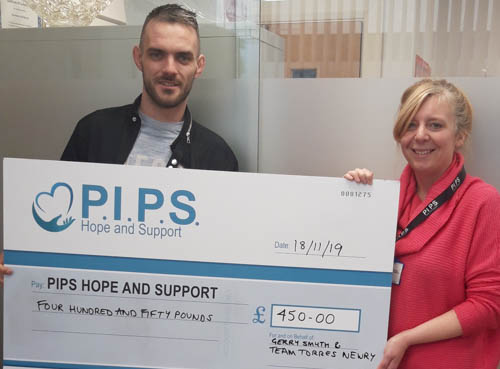 Gerry Smyth is pictured presenting a cheque for £450.00 to PIPS Hope and Support’s Natalie Gorman Gerry Smyth is pictured presenting a cheque for £450.00 to PIPS Hope and Support’s Natalie Gorman