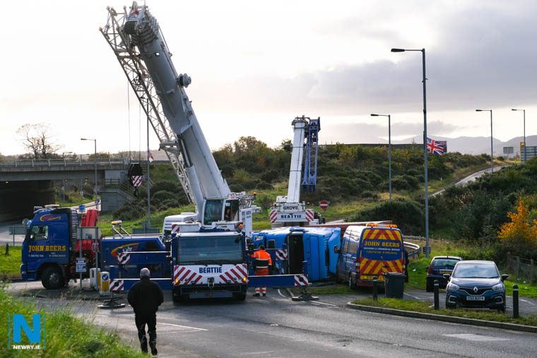 Work in progress to remove an overturned truck on the Armagh Road in Newry. Photograph: Columba O'Hare/ Newry.ie