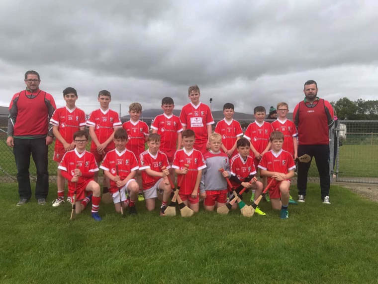 Under 12 team & mentors at the Ballinascreen  GAA Blitz. Míle buíochas to all who helped with looking after the team and travel arrangements
