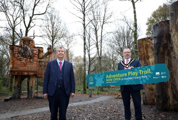 Rural Affairs Minister Edwin Poots MLA and Lord Mayor of Armagh City, Banbridge and Craigavon Borough, Councillor Kevin Savage have officially opened the Adventure Play Trail in Gosford Forest Park at Markethill. Rural Affairs Minister Edwin Poots MLA and Lord Mayor of Armagh City, Banbridge and Craigavon Borough, Councillor Kevin Savage have officially opened the Adventure Play Trail in Gosford Forest Park at Markethill.