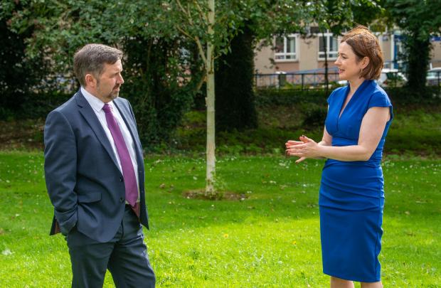 Mental Health Champion Professor Siobhan O’Neill speaking to Health Minister Robin Swann.