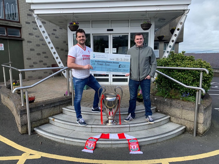 Paul Duffy and Conor McKernan present their cheque to the Southern Area Hospice.