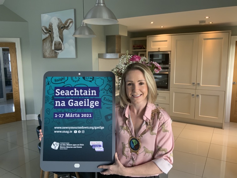 Newry, Mourne and Down District Council Chairperson, Councillor Laura Devlin launches the Council’s specially commissioned programme of online content and events for Seachtain na Gaeilge (Irish Language Week) which will run virtually this year from 1 March through to St Patrick’s Day, 17 March. Seolann Cathaoirleach Chomhairle an Iúir, Mhúrn agus an Dúin, An Comhairleoir Laura Devlin clár speisialta, coimisiúnaithe ag Aonad na Gaeilge, le hábhar agus imeachtaí ar líne do Sheachtain na Gaeilge 2021 a bheas ar siúl ón 1 Márta go Lá Fhéile Pádraig 17 Márta. Newry, Mourne and Down District Council Chairperson, Councillor Laura Devlin launches the Council’s specially commissioned programme of online content and events for Seachtain na Gaeilge (Irish Language Week) which will run virtually this year from 1 March through to St Patrick’s Day, 17 March. Seolann Cathaoirleach Chomhairle an Iúir, Mhúrn agus an Dúin, An Comhairleoir Laura Devlin clár speisialta, coimisiúnaithe ag Aonad na Gaeilge, le hábhar agus imeachtaí ar líne do Sheachtain na Gaeilge 2021 a bheas ar siúl ón 1 Márta go Lá Fhéile Pádraig 17 Márta.