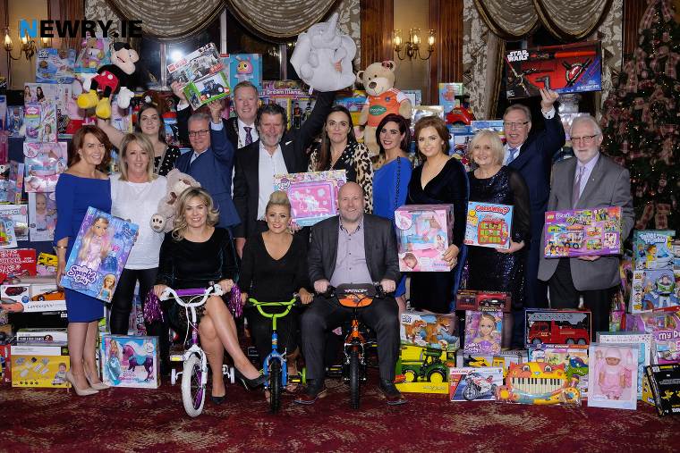 The Newry Charity Christmas Dinner Committee with the toy mountain in 2018. Photograph: Columba O'Hare The Newry Charity Christmas Dinner Committee with the toy mountain in 2018. Photograph: Columba O'Hare