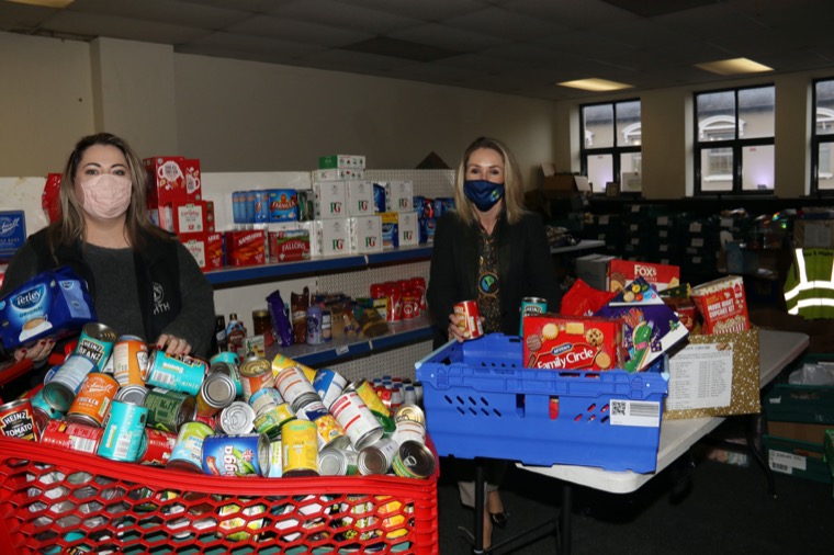 Newry, Mourne and Down District Council Chairperson, Councillor Laura Devlin helps Newry Food Bank Manager, Stella Maguire pack up one of many food boxes for families in the area. Newry, Mourne and Down District Council Chairperson, Councillor Laura Devlin helps Newry Food Bank Manager, Stella Maguire pack up one of many food boxes for families in the area.