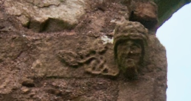 Carved human head with foliage decoration acting as a label stop on the window of east church. Newry and Mourne Museum Carved human head with foliage decoration acting as a label stop on the window of east church. Newry and Mourne Museum