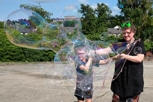 Blowing bubbles at Newry Water Festival 