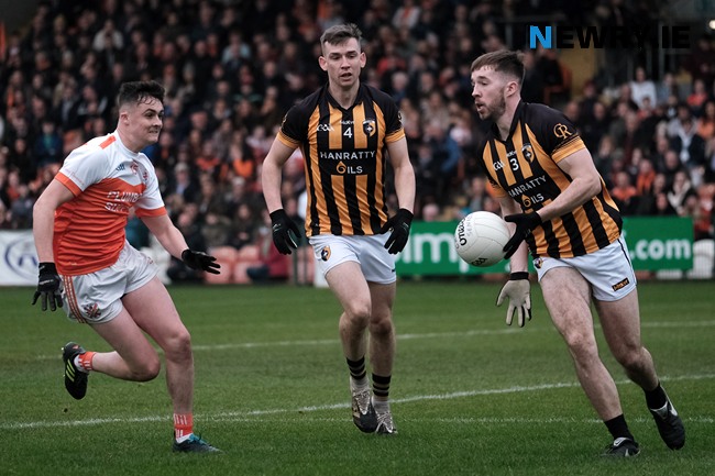 Crossmaglen's Caolan Dillon looks a way past Clann Éireann's Aodhan McConville at the Armagh County Final. Crossmaglen's Caolan Dillon looks a way past Clann Éireann's Aodhan McConville at the Armagh County Final.