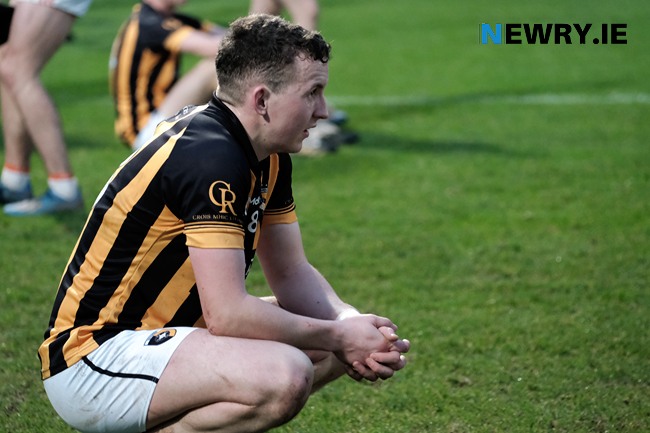 Disappointment for Crossmaglen's Captain Stephen Morris after losing out to Clann Éireann. Disappointment for Crossmaglen's Captain Stephen Morris after losing out to Clann Éireann.