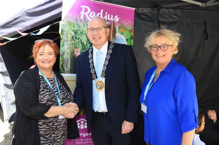 Newry, Mourne and Down District Chairperson Councillor Michael Savage with (L to R) Blanaid Bruce, Community Officer Radius Housing and Jean Dawson, Scheme  Co-ordinator Radius Housing.
