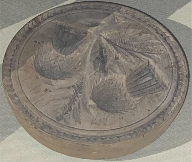 Wooden butter mould with thistle motif from a farm near Bessbrook in south Armagh. Every farm or butter producer had their own motif. Newry and Mourne Museum Collection Wooden butter mould with thistle motif from a farm near Bessbrook in south Armagh. Every farm or butter producer had their own motif. Newry and Mourne Museum Collection