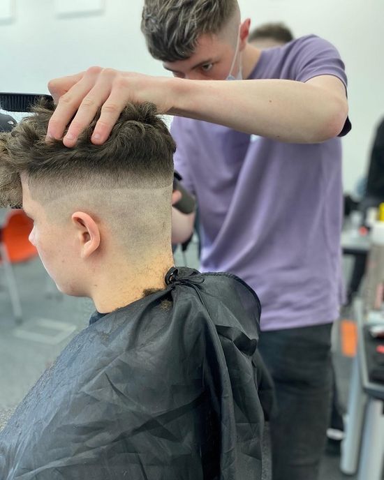  Leon McNamee (Level 2 Barber Newry) competing.