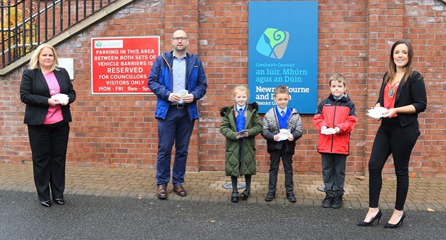 Newry, Mourne and Down District Council Chairperson, Councillor Cathy Mason with (from left) Newry, Mourne and Down District Council CEO, Marie Ward and Principal Niall Loughran Bunscoil an Iuir; pupils Aoibheann, Deoigán and Lorcán. Newry, Mourne and Down District Council Chairperson, Councillor Cathy Mason with (from left) Newry, Mourne and Down District Council CEO, Marie Ward and Principal Niall Loughran Bunscoil an Iuir; pupils Aoibheann, Deoigán and Lorcán.
