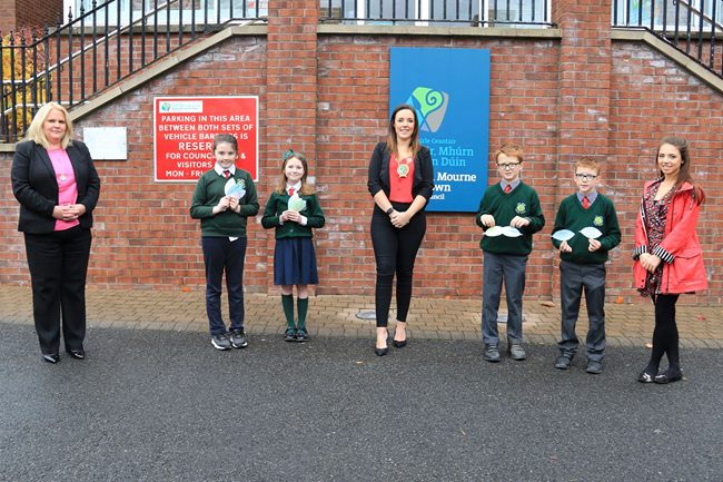 Newry, Mourne and Down District Council Chairperson, Councillor Cathy Mason with (from left) Newry, Mourne and Down District Council CEO, Marie Ward, Holy Cross Primary School, Atticall pupils Darcie, Ella, Jack and Harry. Newry, Mourne and Down District Council Chairperson, Councillor Cathy Mason with (from left) Newry, Mourne and Down District Council CEO, Marie Ward, Holy Cross Primary School, Atticall pupils Darcie, Ella, Jack and Harry.