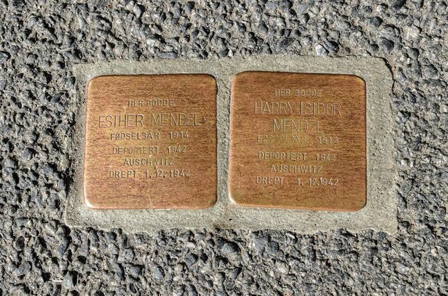 Snublesteiner or ‘Stumbling Stones’ are laid down in pavements all over Europe to commemorate Holocaust victims. These two stones were laid down outside the Mendel home in Oslo in June 2016 in memory of Esther and Harry Mendel. Photograph by Gunnar M. Henriksen. Courtesy of Lill Fanny Saether Snublesteiner or ‘Stumbling Stones’ are laid down in pavements all over Europe to commemorate Holocaust victims. These two stones were laid down outside the Mendel home in Oslo in June 2016 in memory of Esther and Harry Mendel. Photograph by Gunnar M. Henriksen. Courtesy of Lill Fanny Saether