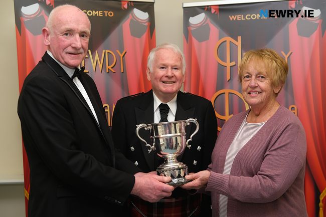 Secure Shred NI were the main sponsor at Newry Drama Festival and Brendan Durkin, left is pictured presenting the Violet Durkan Cup for the best Decor at the festival to Barbara McCombe, Bunclody/ Kilmyshall Group who performed The Good Father. Looking on is Adjudicator, Brian Marjoribanks. Photograph: Columba O'Hare/ Newry.ie