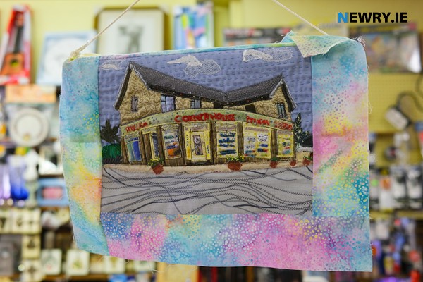 A beautiful piece of tapestry by Mary Moriarty immortalises the shop. A beautiful piece of tapestry by Mary Moriarty immortalises the shop.