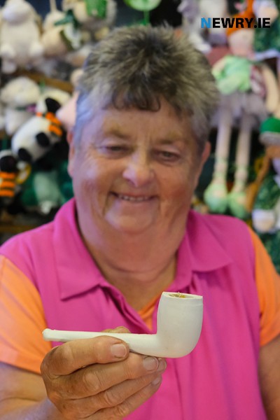 Frances shows us a clay pipe, just one of the thousands of items for sale. Photograph: Columba O'Hare/ Newry.ie Frances shows us a clay pipe, just one of the thousands of items for sale. Photograph: Columba O'Hare/ Newry.ie