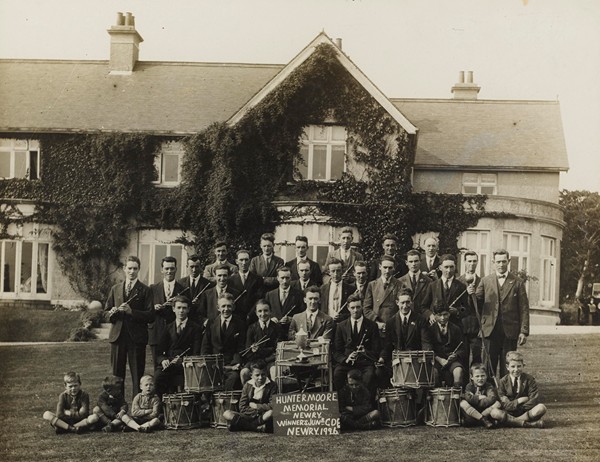 Photograph of prizewinning Hunter Moore Memorial Band taken in the grounds of Moore Lodge in 1926. Newry and Mourne Museum Collection Photograph of prizewinning Hunter Moore Memorial Band taken in the grounds of Moore Lodge in 1926. Newry and Mourne Museum Collection