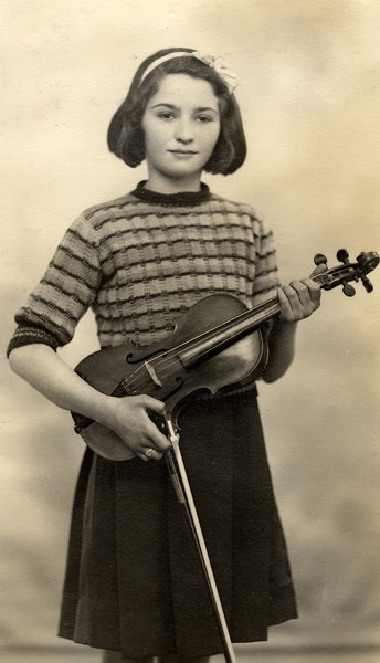 Kathleen McNally, a leading prize-winner in the violin classes at Newry Musical Feis in the early 1940s, played in the orchestra at many of the variety concerts held in Newry Town Hall. Newry and Mourne Museum Collection. Kathleen McNally, a leading prize-winner in the violin classes at Newry Musical Feis in the early 1940s, played in the orchestra at many of the variety concerts held in Newry Town Hall. Newry and Mourne Museum Collection.