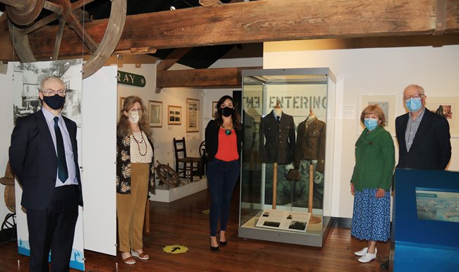 Newry, Mourne and Down Council Chairperson, Councillor Cathy Mason, at the launch of a display of World War II uniforms at Newry and with Museum with (left to right) Assistant Curator Dr Ken Abraham, Museum Curator, Noreen Cunningham and Joe and Marie Boden who previously cared for the uniform worn by James Quinn for several years in their ‘Olden Days and Olden Ways Collection’. 
