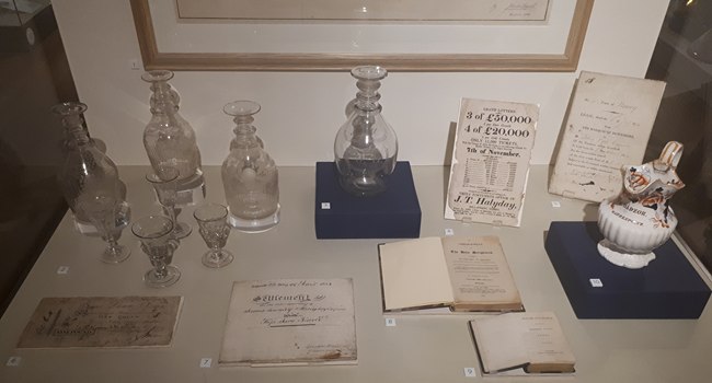 Newry glass on display at Newry and Mourne Museum with other artefacts from the 18th and early 19th centuries. Newry and Mourne Museum Collection