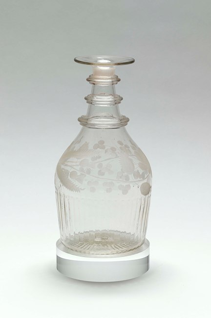 A Newry glass decanter decorated with Act of Union motifs. Newry and Mourne Museum Collection
