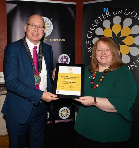 Pictured at the ONUS accreditation ceremony for Newry, Mourne and Down District Council are Council Chairperson, Councillor Michael Savage and Naomi Long MLA who presented the Gold Certificate Award to Council at the Onus NI Awards ceremony in November.    