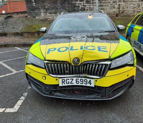 The police car that was damaged in the incident.