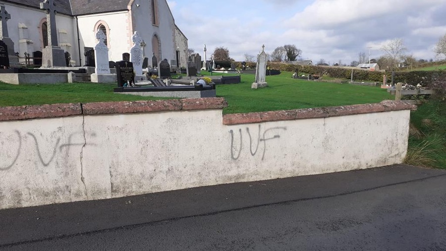 Grafitti on the wall surrounding the graveyard at St Teresa's Tullyherron.