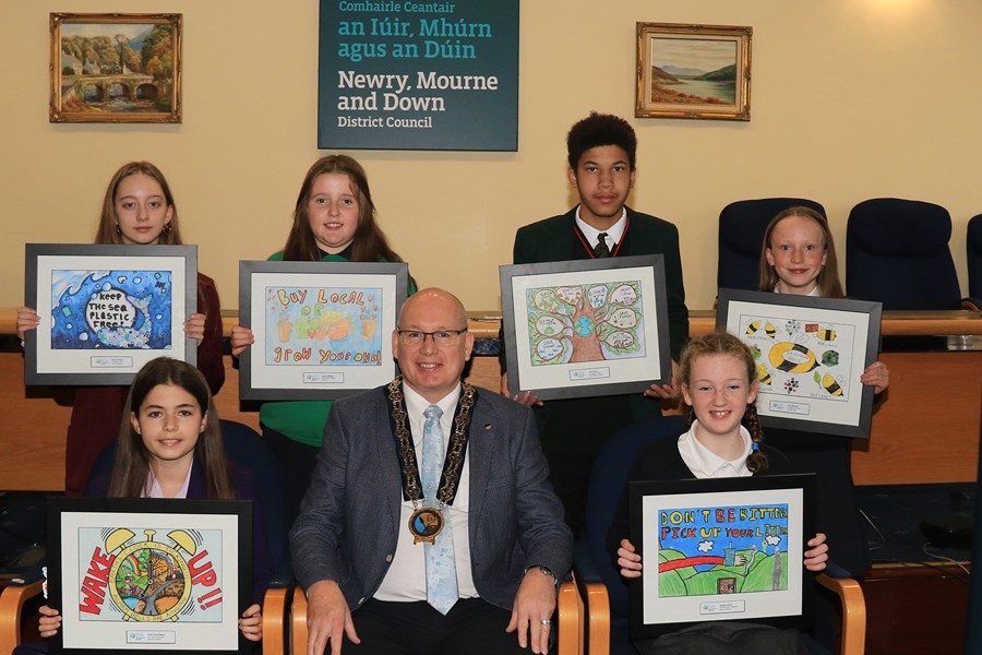 Newry, Mourne and Down District Council Chairperson Councillor Michael Savage pictured with winners and finalists in the Council’s Schools’ Environmental Poster Competition. Included back from left: Senior Runner Up Maja Frydrych, St. Mary’s High School Newry; Junior Runner Up Gracie Morgan, Dromintee Primary School; Senior Runner Up Tony Alinta St Joseph’s Boys’ High School Newry; Junior Runner Up Lucy McGrath St. Mary’s Primary School Barr. Front: Overall Senior Winner Kara Cunningham St. Louis Grammar School Kilkeel and Overall Junior Winner Jessica Brown, Ansborough Integrated Primary School.