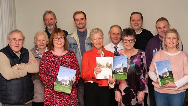 Launching the Poyntzpass and District Local History Society's latest production of 'Before I Forget' are from left: Frank Watters, Editor; Dympna Hamilton, Committee; Hugh Daly, Secretary;  Fiona Bryson, Chairperson; Robert Morrow, Vice Chairperson; Barbara Best, Treasurer; Brian O'Hare, Committee; Helena Gamble, Committee; Marc McComiskey, Committee; Adrian Murdoch, Committee and Deirdre Graham, Committee. Missing is Roy Copeland. 