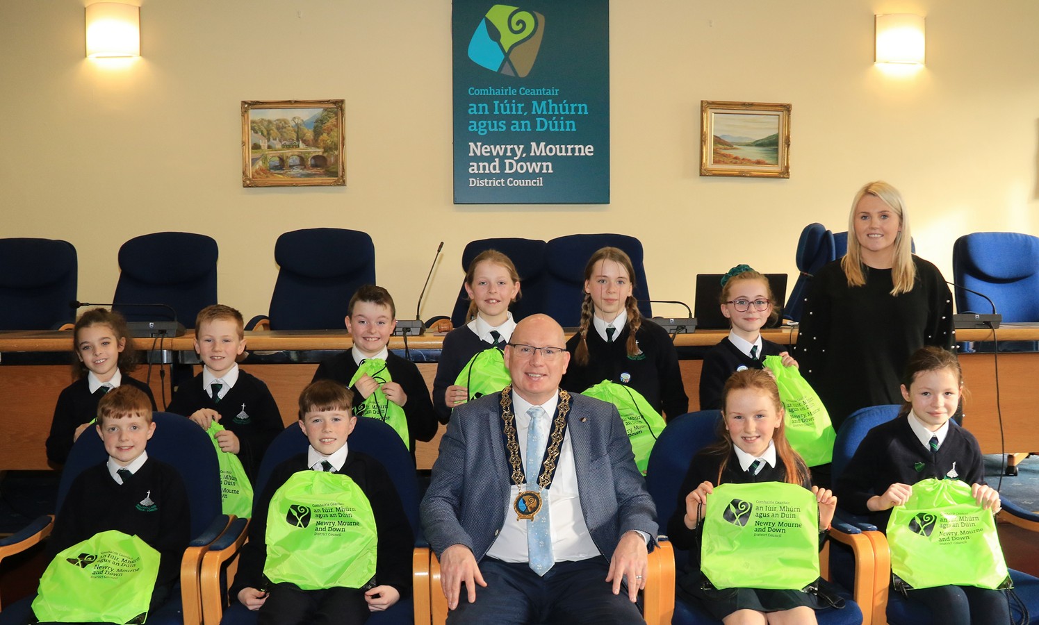 Newry, Mourne and Down District Council Chairperson, Councillor Michael Savage pictured with Ballyholland Primary School Children and their teacher, Niamh Walsh. 