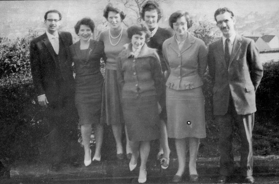 Dr Ghana (first left) and John Berry (first right), Chief Administrative Officer, with administration staff at Daisy Hill Hospital c.1970. Courtesy of Daniel McKevitt