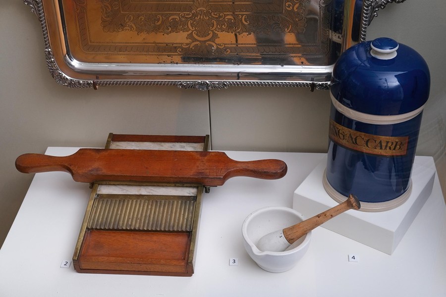 A Pill maker and mortar and pestle from Kilkeel dispensary, currently on display at Newry and Mourne Museum in the Caring for the Community exhibition. Newry and Mourne Museum Collection