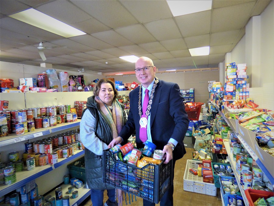 Newry, Mourne and Down Council Chairperson, Councillor Michael Savage with (from left to right) The Larder, Newry Volunteers Stella Maguire.