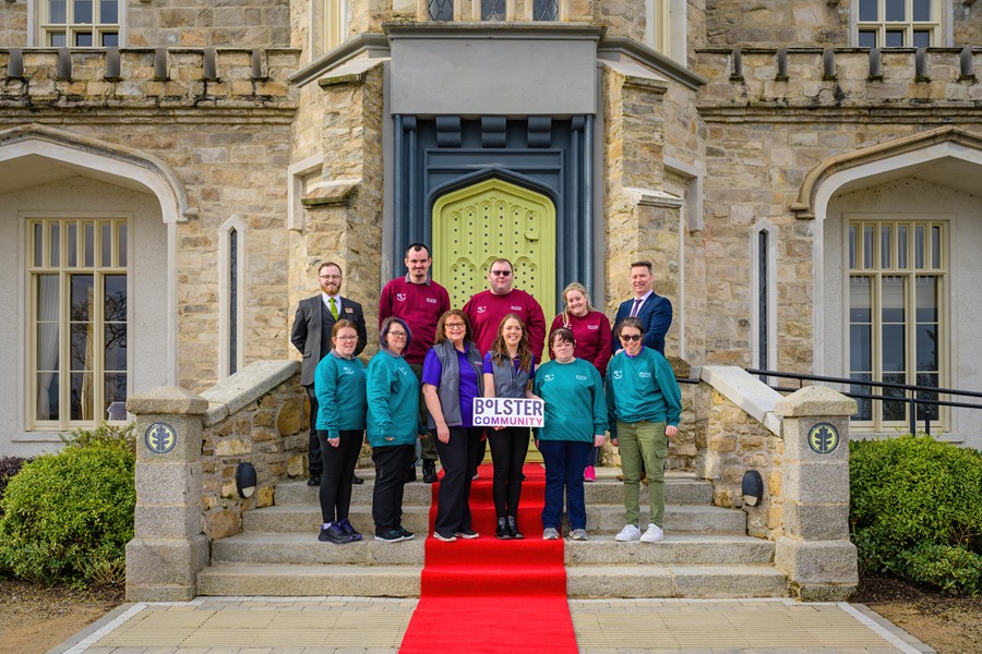 Killeavy Castle Estate has appointed local charity, Bolster Community, as its charity partner for a second year running. Members of the Bolster Community and Acorn Candles teams joined some of the Killeavy Castle Estate team for a special afternoon tea in Killeavy Castle to celebrate the ongoing partnership and their work to date.