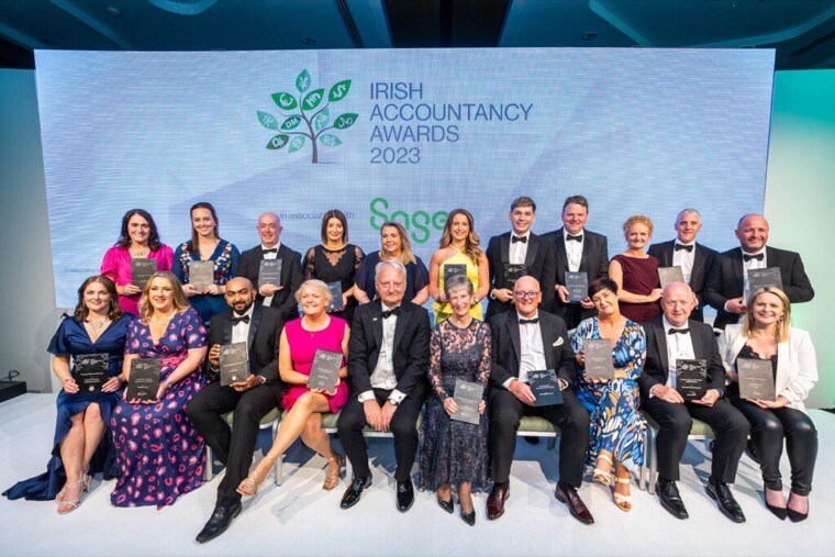 FPM Partners Teresa Campbell and Michelle Hawkins receiving the awards for ‘Advisory Team of the Year’ and ‘Employer of the Year’ alongside other winners.