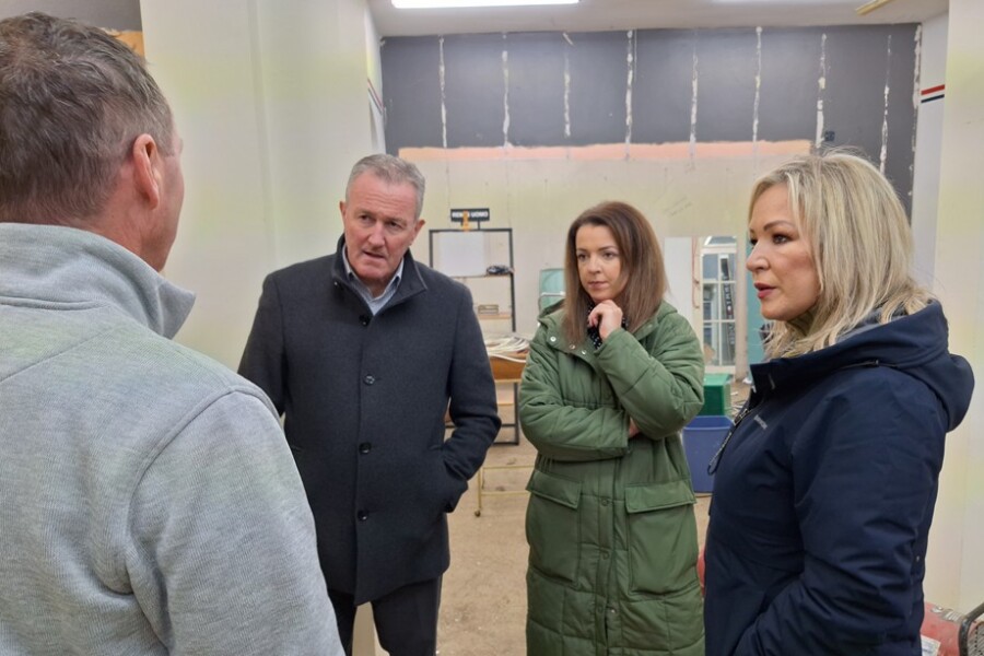 MLA's Conor Murphy, Liz Kimmins and Michelle O'Neill speak to one of the business people affected by the recent flooding.