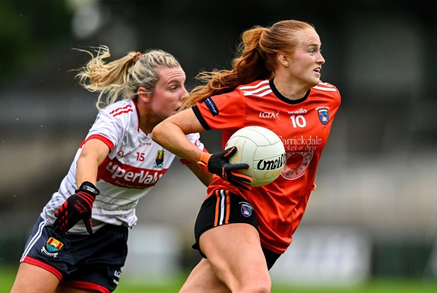 Blaithín Mackin of Armagh evades the tackle of Emma Cleary of Cork during the TG4 Ladies Football All-Ireland Senior Championship quarter-final match at BOX-IT Athletic Grounds in Armagh. Photograph: Ben McShane/Sportsfile