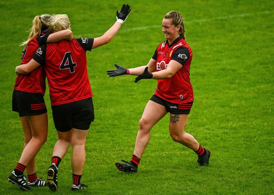 Paige Smyth of Down, right, celebrates with teammates after the TG4 LGFA All-Ireland Junior Championship semi-final match between Down and Carlow at Parnell Park in Dublin. Photograph: Eóin Noonan/Sportsfile 