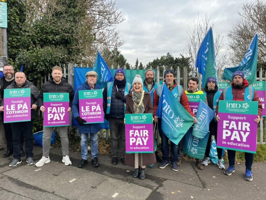 Mickey Brady MP joins the picket line yesterday.