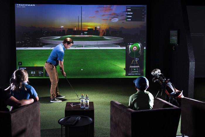 One of the state-of-the-art TrackMan indoor golf simulators in action.