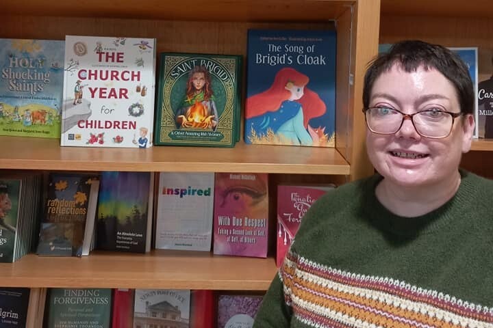 Author Lorraine Mulholland with her book on the shelf at the Veritas store in Newry.