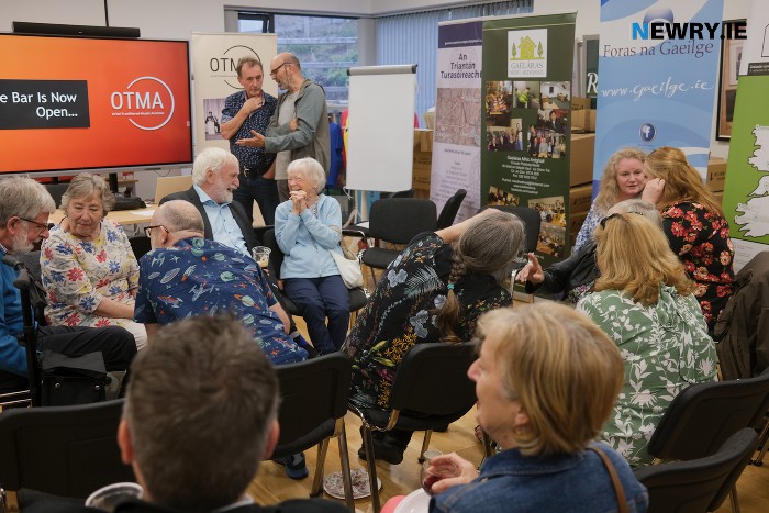 Enjoying the chat at the launch of The Oriel Traditional Music Archive in Gaeláras Mhic Ardghail